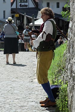 Piper in Typical Folklore Costume of Southern Bohemia, Cesky Krumlov, Czech Republic